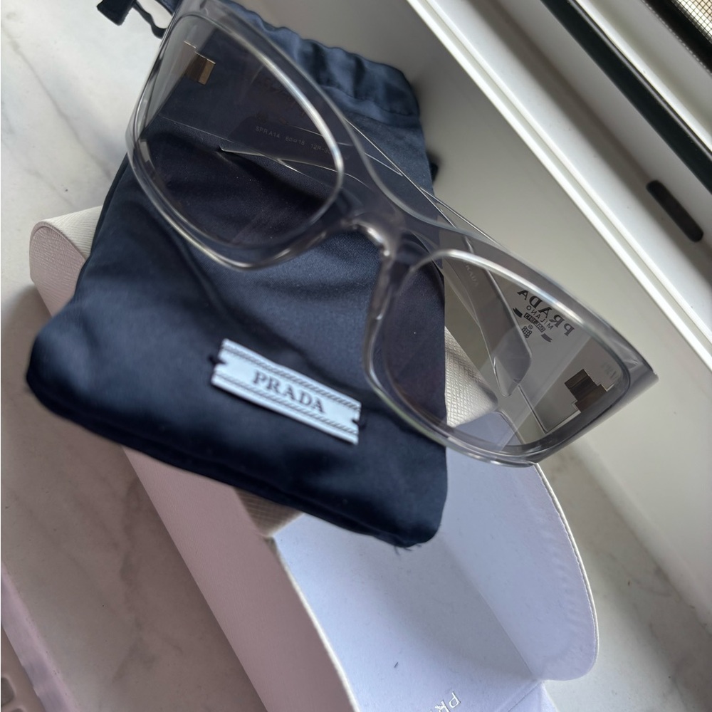 Prada Clear Frame Sunglasses with Gray Lenses - Picture 7 of 7